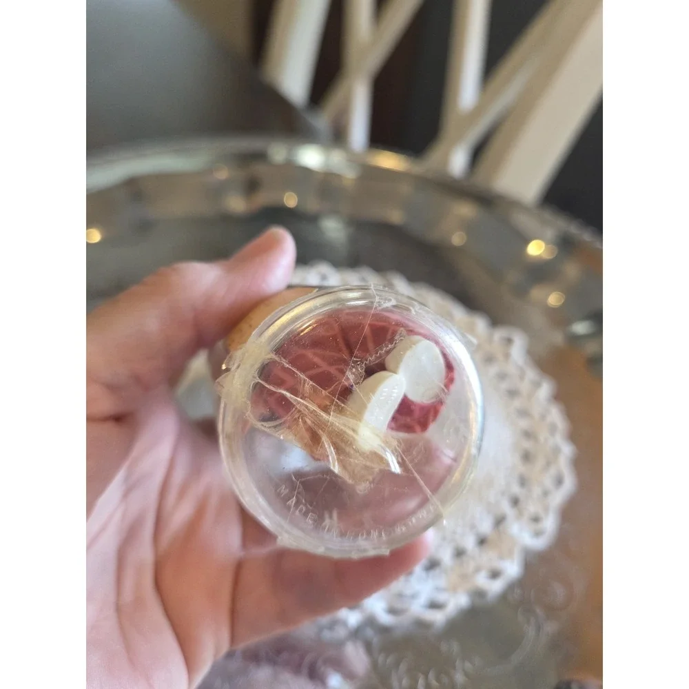 vintage 1960s Cola Kids doll is encased in a clear plastic bottle